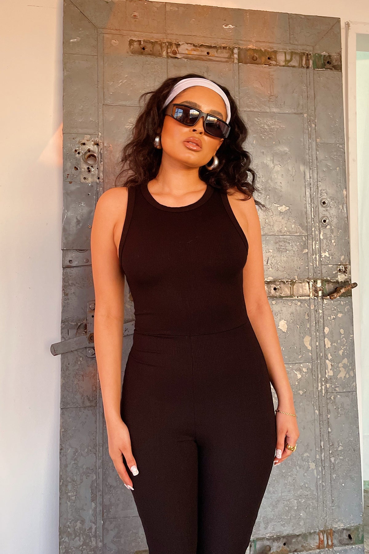 Take Ten Black Ribbed Flare Jumpsuit - FINAL SALE