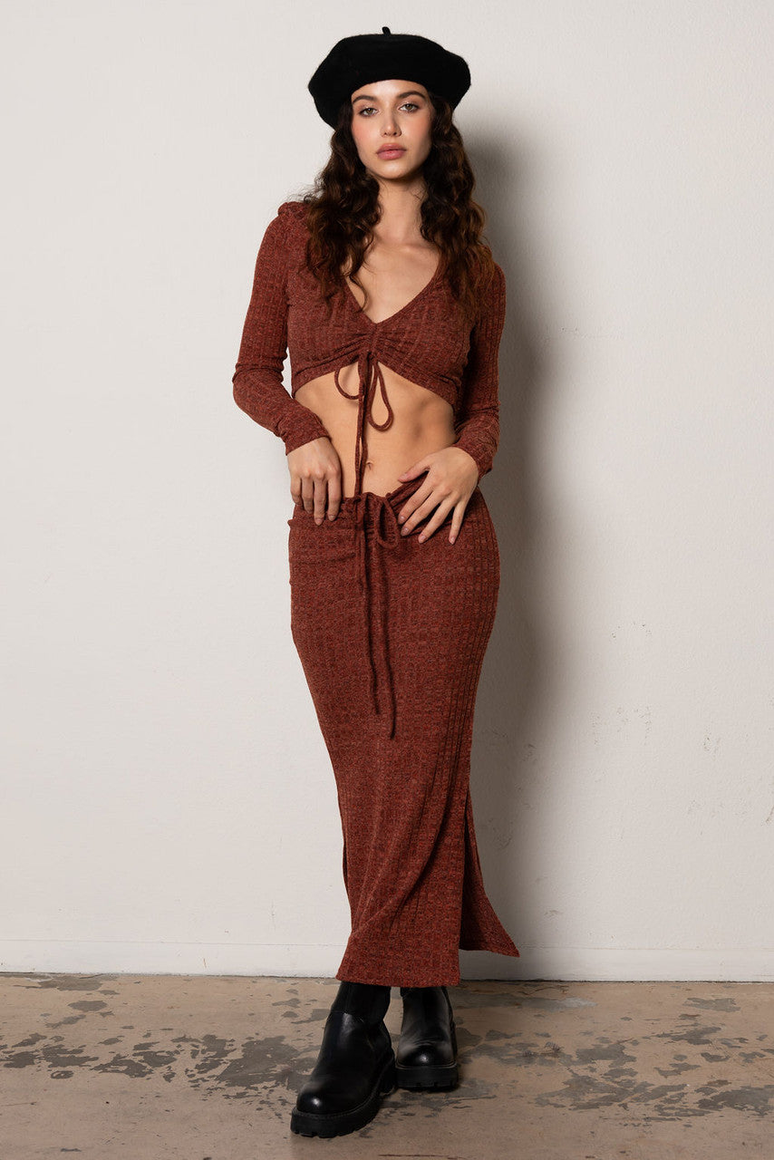 Trendy crop top and midi skirt with tie ruched front.